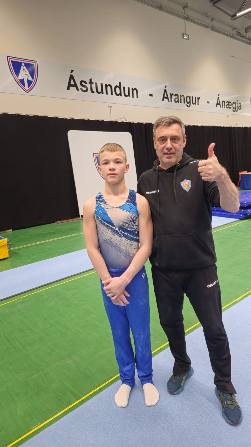 Patrekur á íslandsmóti með þjálfaranum sínum Siarhei Hubuski.